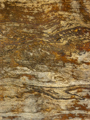 Typical detail of an ancient Italian house wall, made of hand-carved river stones.