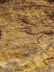 Typical detail of an ancient Italian house wall, made of hand-carved river stones.