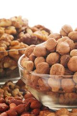 Different nuts in glass cups	