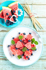 watermelon slices in the shape of hearts and stars