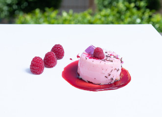 Delicious small fancy cakes. Decorated with berries
