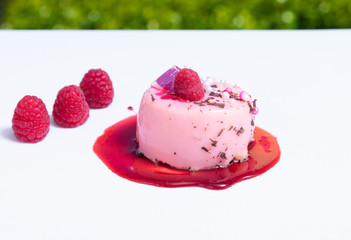 Delicious small fancy cakes. Decorated with berries