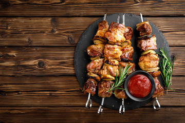Grilled meat skewers, shish kebab on wooden background, top view - 267894732