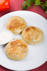 Fried buns stuffed with meat