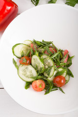 Prepared cucumber and tomato salad