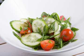Prepared cucumber and tomato salad