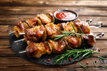 Grilled meat skewers, shish kebab on wooden background - 267894994