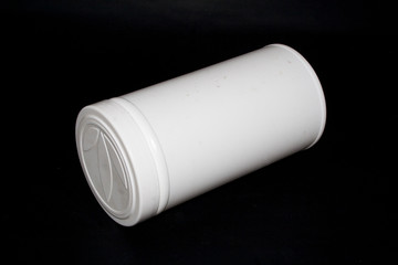 plastic can isolated on black background