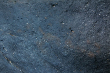 Background and black marble. Bedrock Stone In the forest near the waterfall
