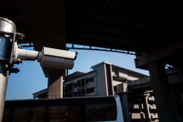 Closed-circuit television,Security CCTV camera or surveillance system in background of International Airport ,Passenger Terminal taxi ,Tropical zone color