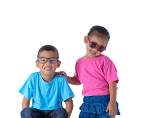 portrait of little boy and girl is colorful T-shirt with glasses isolated on white background