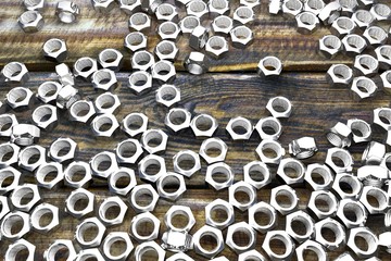 nuts on old wooden boards - nice industrial 3D illustration, image for art using