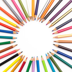 Colour pencils isolated on white background. Back to school concept Wood texture pencil with sharpening shavings on white background pencil on table, the blogger instrument. copyspace, space for text.