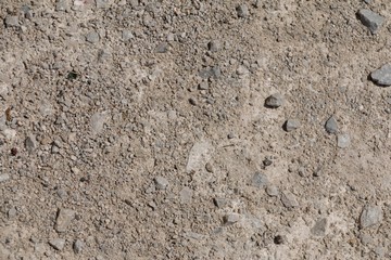 surface or wall with small stones and concrete for background