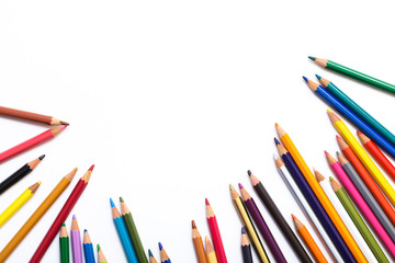 Colour pencils isolated on white background. Back to school concept Wood texture pencil with sharpening shavings on white background pencil on table, the blogger instrument. copyspace, space for text.