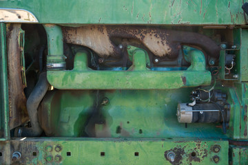 Green agriculture tractor diesel engine.