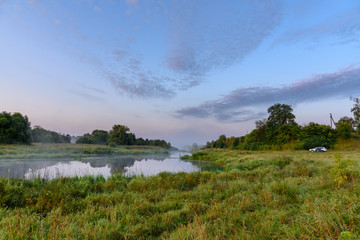 Fototapeta na wymiar Morning landscape on the river - calm and silence