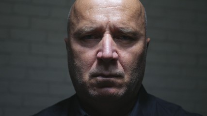 Close Up Man Portrait Looking Serious and Disappointed to Camera