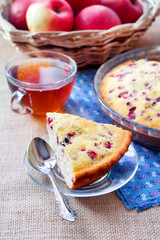 Piece of homemade cowberry pie on a pate