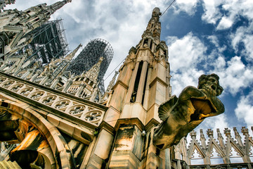 The spires of white marble that adorn the Milan Cathedral Duomo. Milan, Lombardy, Italy. May 2012