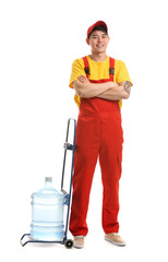 Asian delivery courier with bottle of water on white background