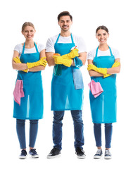 Team of janitors on white background