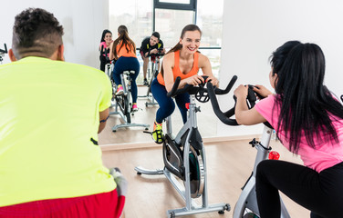 Woman exercising on bicycle