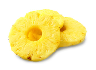 Circles of ripe pineapple on white background