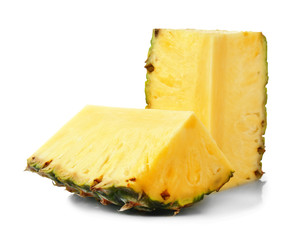 Pieces of ripe pineapple on white background