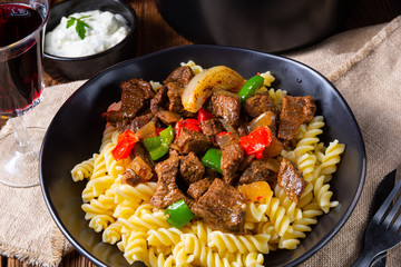 Fussili noodle with klaschise spicy goulash and paprika