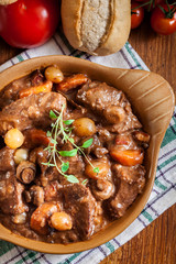 Beef Bourguignon stew served with baguette