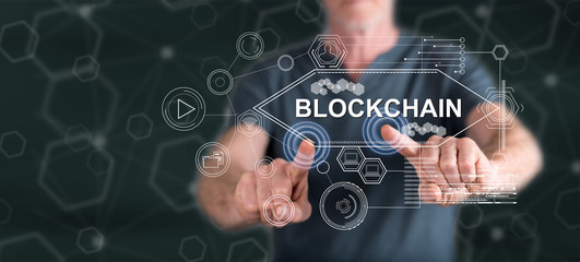Man touching a blockchain concept