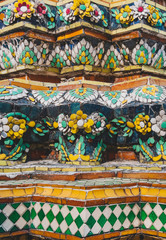 Fototapeta na wymiar Wat Pho Colourful tiles floral pattern Mosaic on Pagoda Temple Landmark Architecture Bangkok Thailand