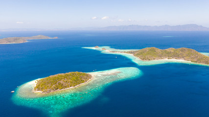 Fototapeta na wymiar Islands of the Malayan archipelago with turquoise lagoons. Nature of the Philippines, top view. Philippines, Palawan