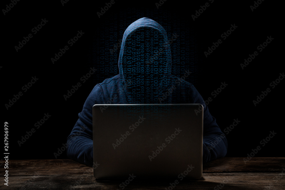 Poster anonymous computer hacker over abstract digital background. obscured dark face in mask and hood. dat