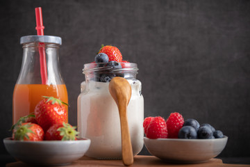 yogurt with fruit on a breakfast table