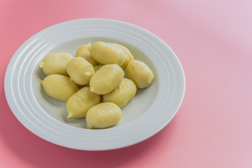 gnocchi stuffed with pesto with homemade tomato sauce and cheese