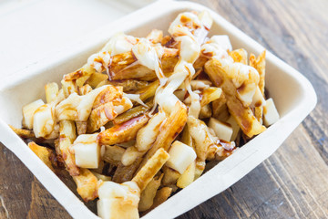 Chips potatoes fried and  mozzarella and sauce gravy