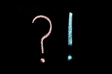 exclamation and question marks on chalkboard