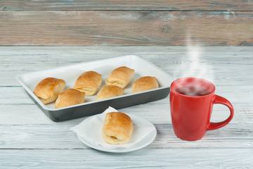 Pie and a cup of coffee on wood table