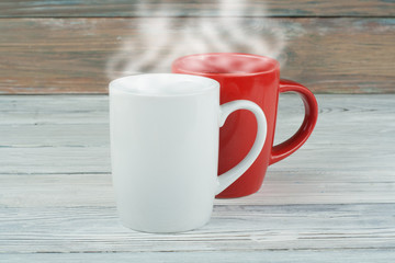 two cups of coffee on the wooden table,