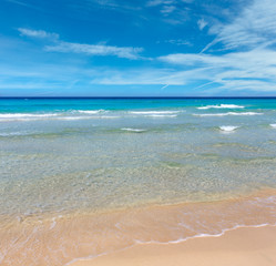 Sea surf on beach.