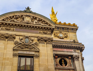 Fototapeta na wymiar Architectural details of facade of Paris Opera (Palais Garnier). France. April 2019
