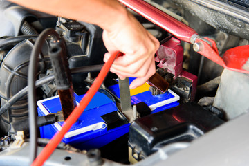 jumping the car battery of old car / charging car battery 