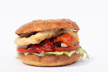 Big tasty burger on background on the wooden table