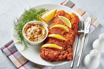 close-up of Breaded fish fillet, top view