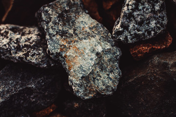 precious mineral ore among the stones