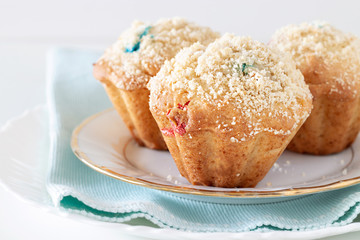 Healthy Apple Oats streusel Muffins on white plate. Selective focus. Copy space.