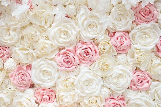 Beautiful white and pink roses Background. Rose wall. Artificial roses.