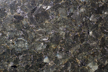 Natural stone gray granite, consisting as if of mica plates